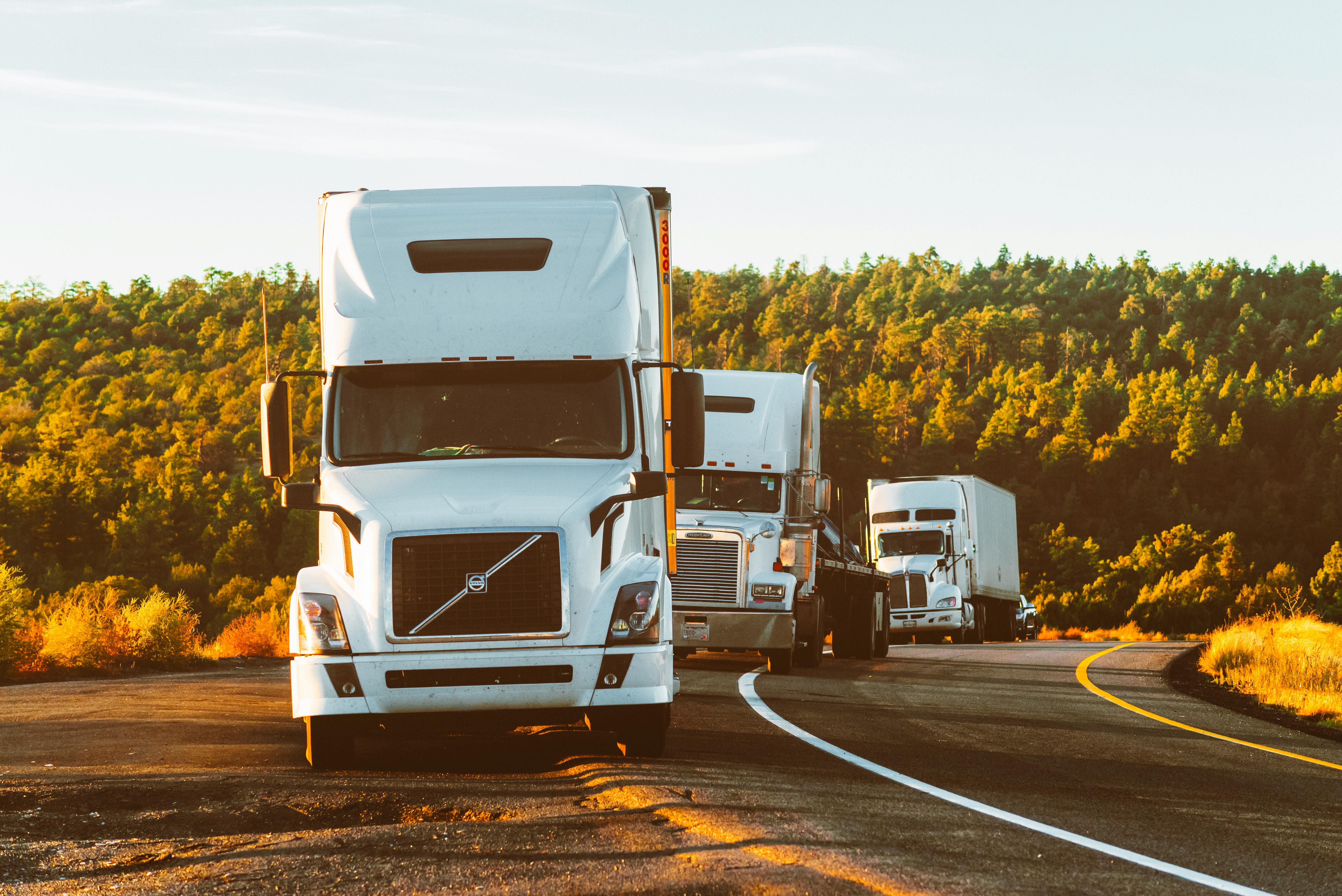 Fleet of trucks equipped with Low Cost Tracker IoT tracking and telematics systems