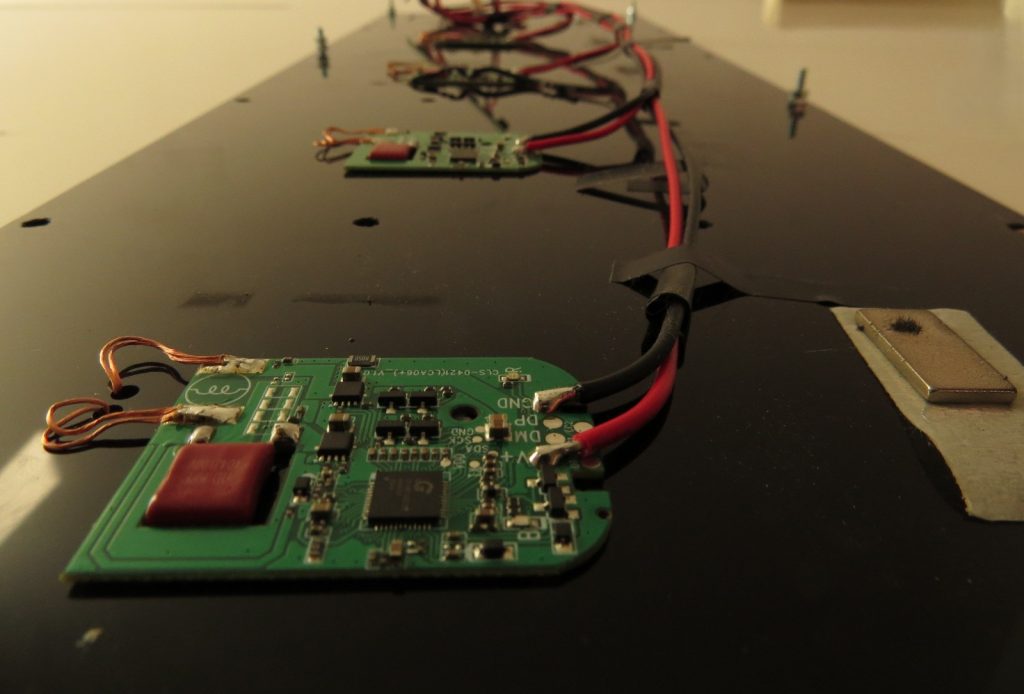 the inside of the wireless charger, every pcb is the electronic component able to set the wireless charging
